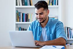 happy man on computer